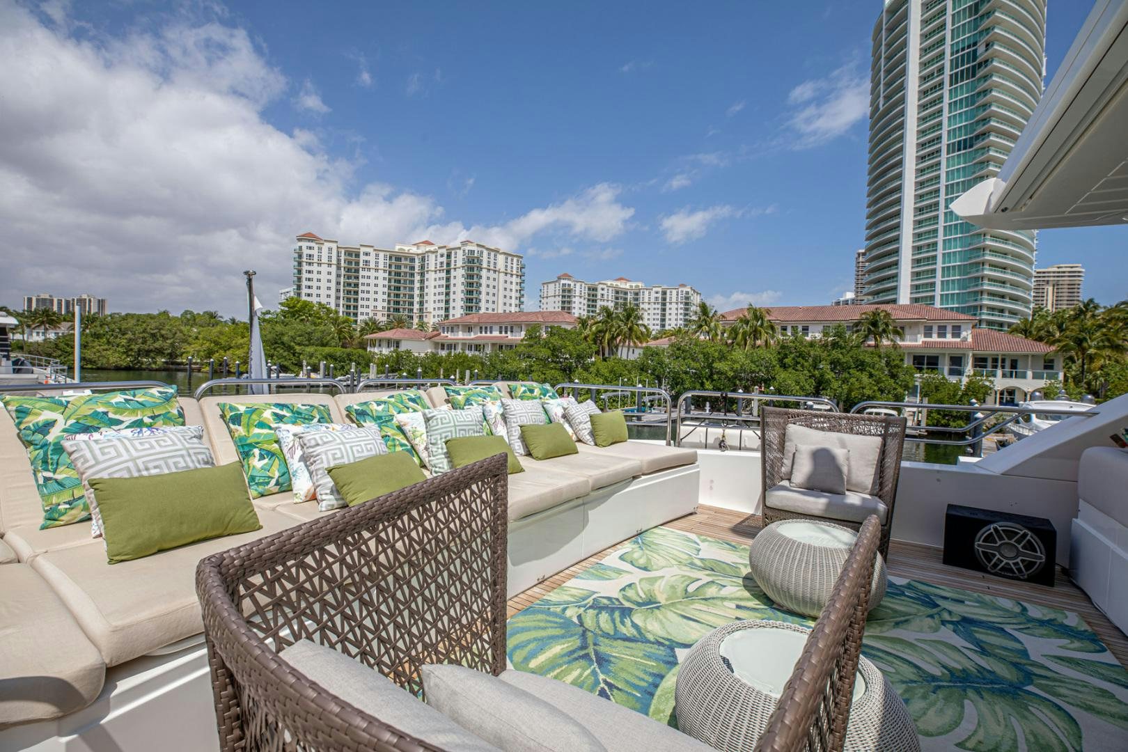 a patio with chairs and a pool aboard LE SORELLE III Yacht for Sale