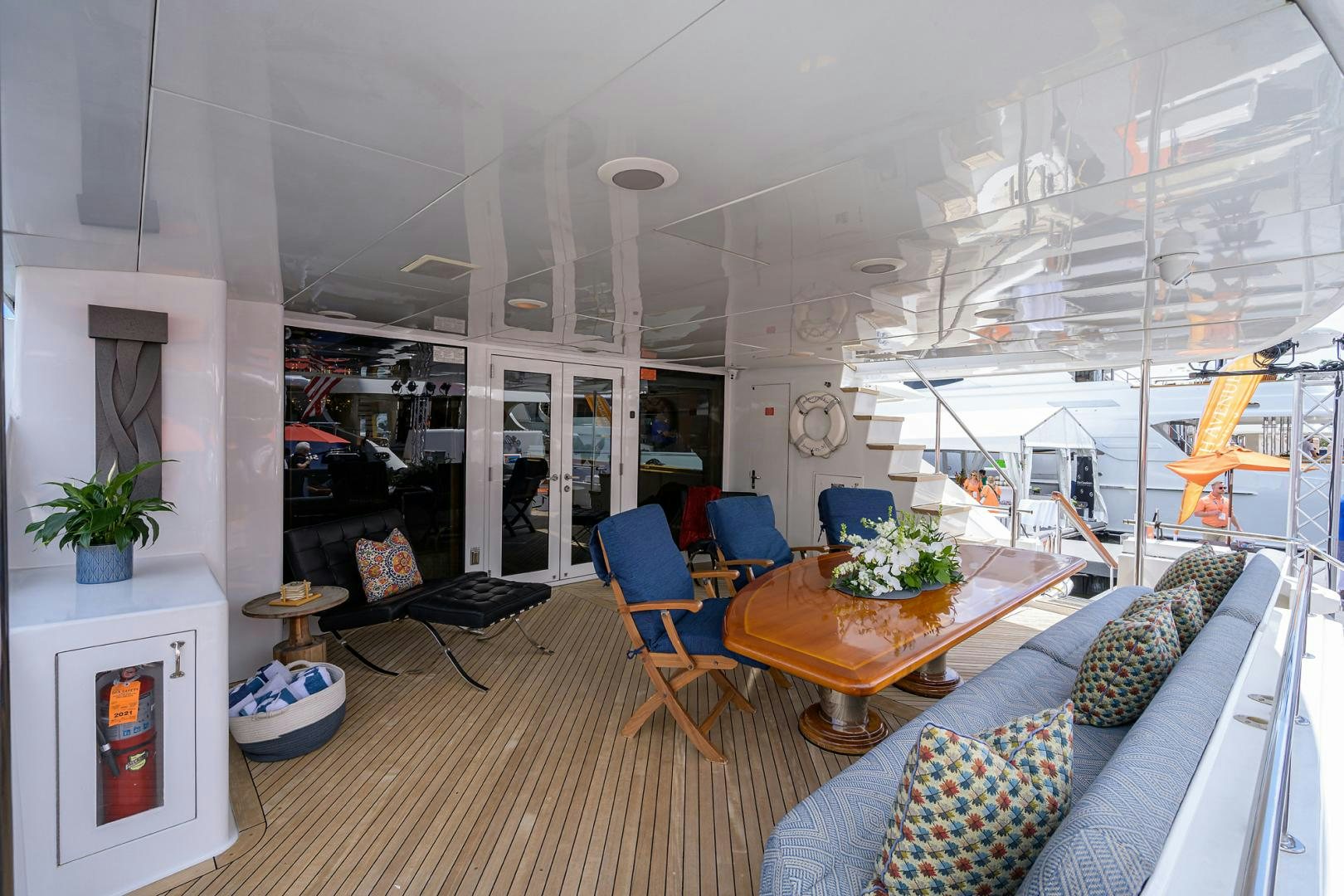 a living room with a large open floor plan aboard MEMORYMAKER Yacht for Sale