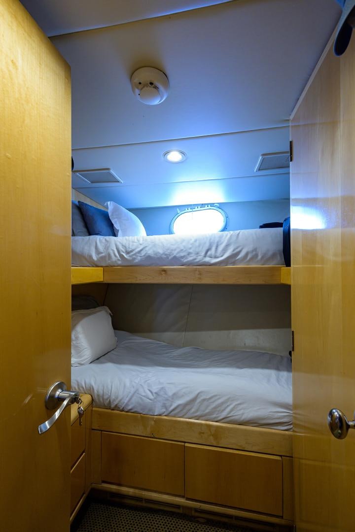 a room with bunk beds aboard MEMORYMAKER Yacht for Sale