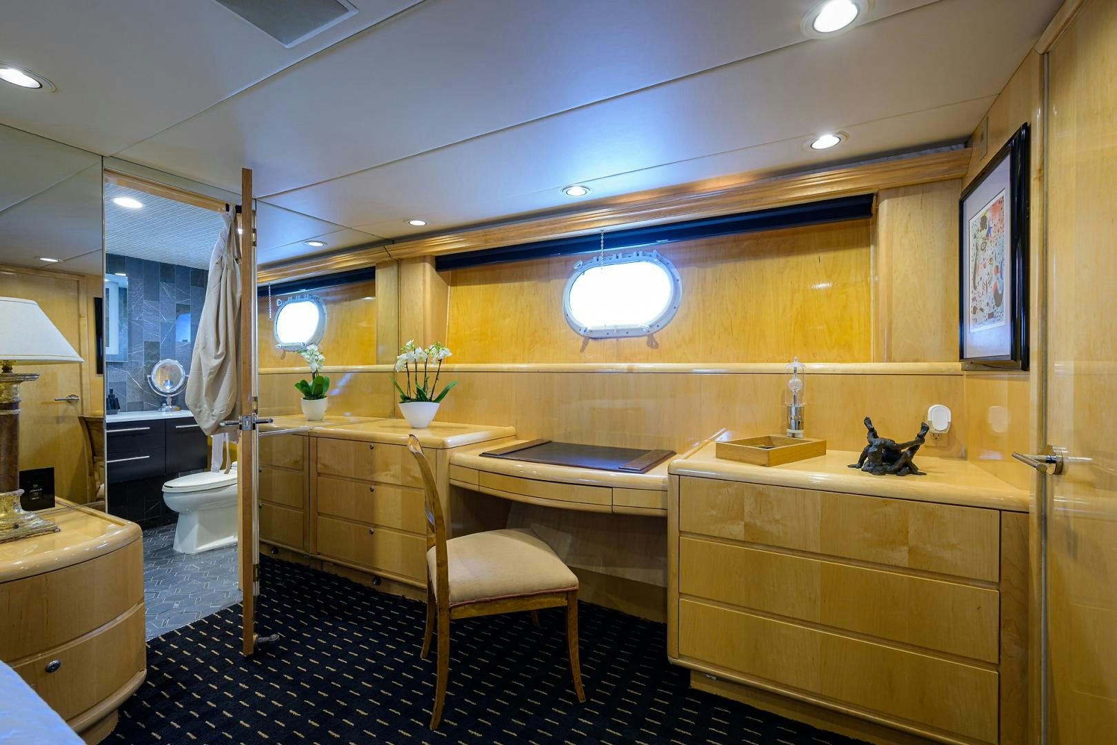 a bathroom with a sink and a toilet aboard MEMORYMAKER Yacht for Sale
