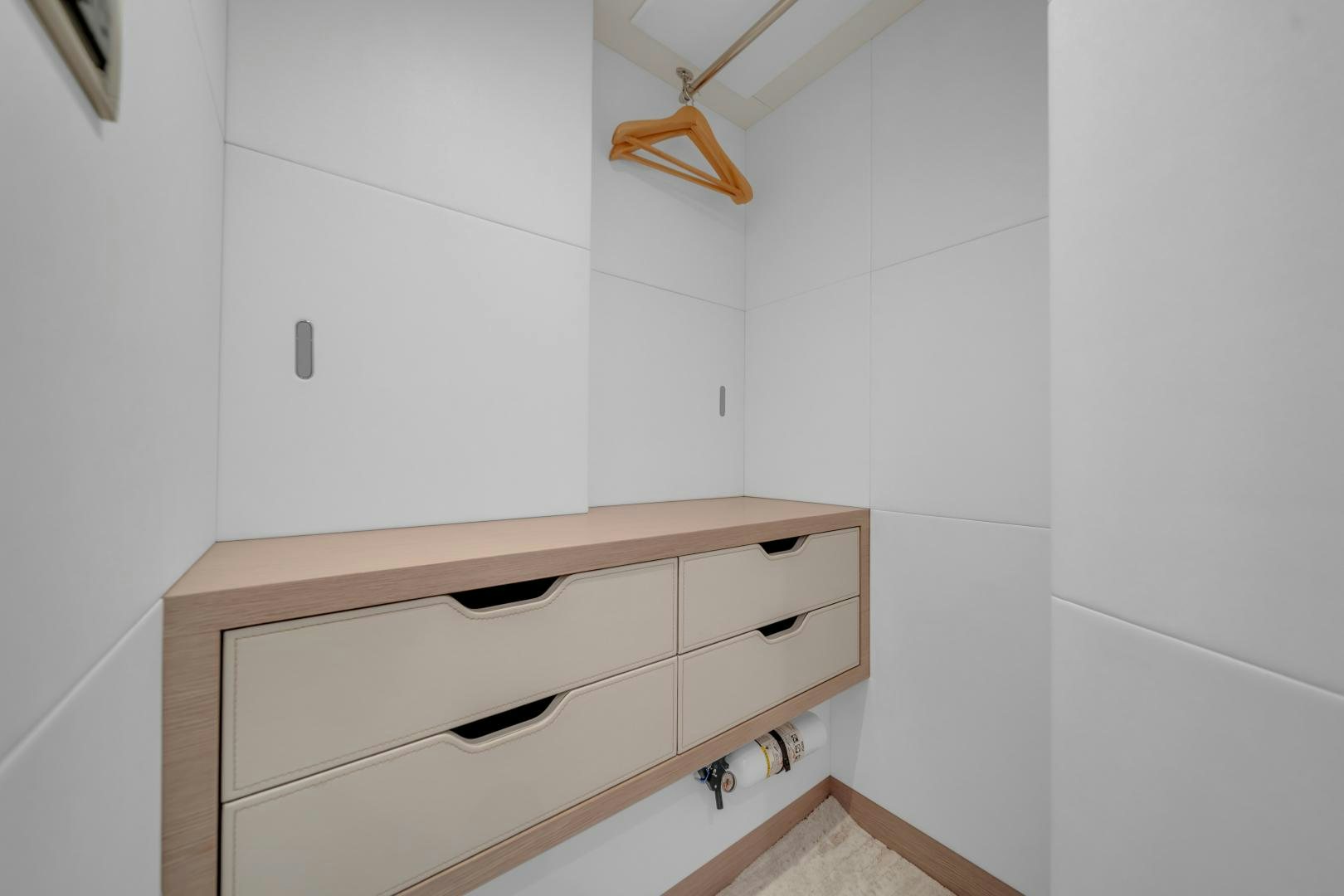 a white shelf with a light fixture aboard CARBON COPY Yacht for Sale