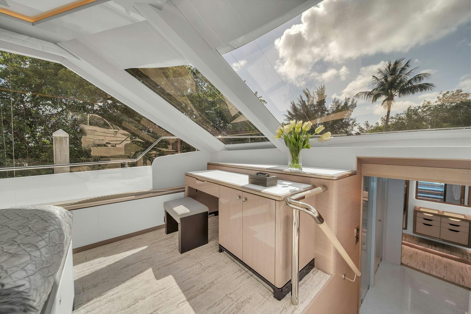 a room with a table and chairs aboard CARBON COPY Yacht for Sale