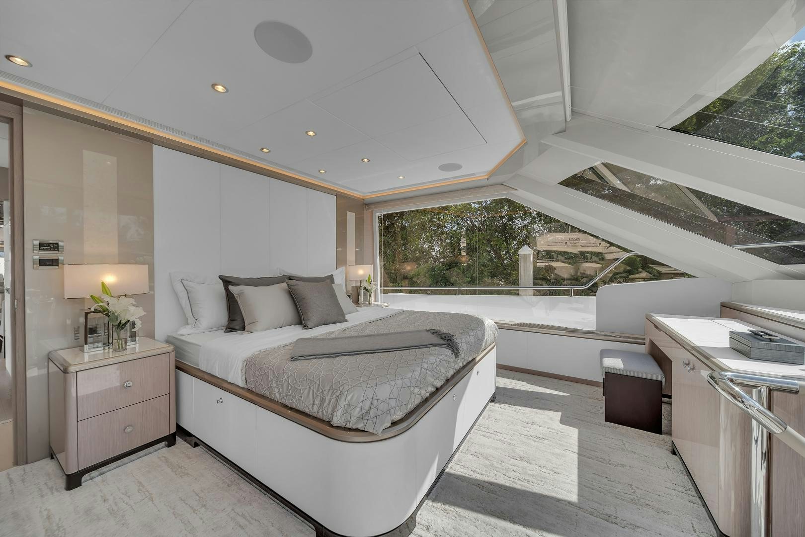 a large white bed in a room aboard CARBON COPY Yacht for Sale