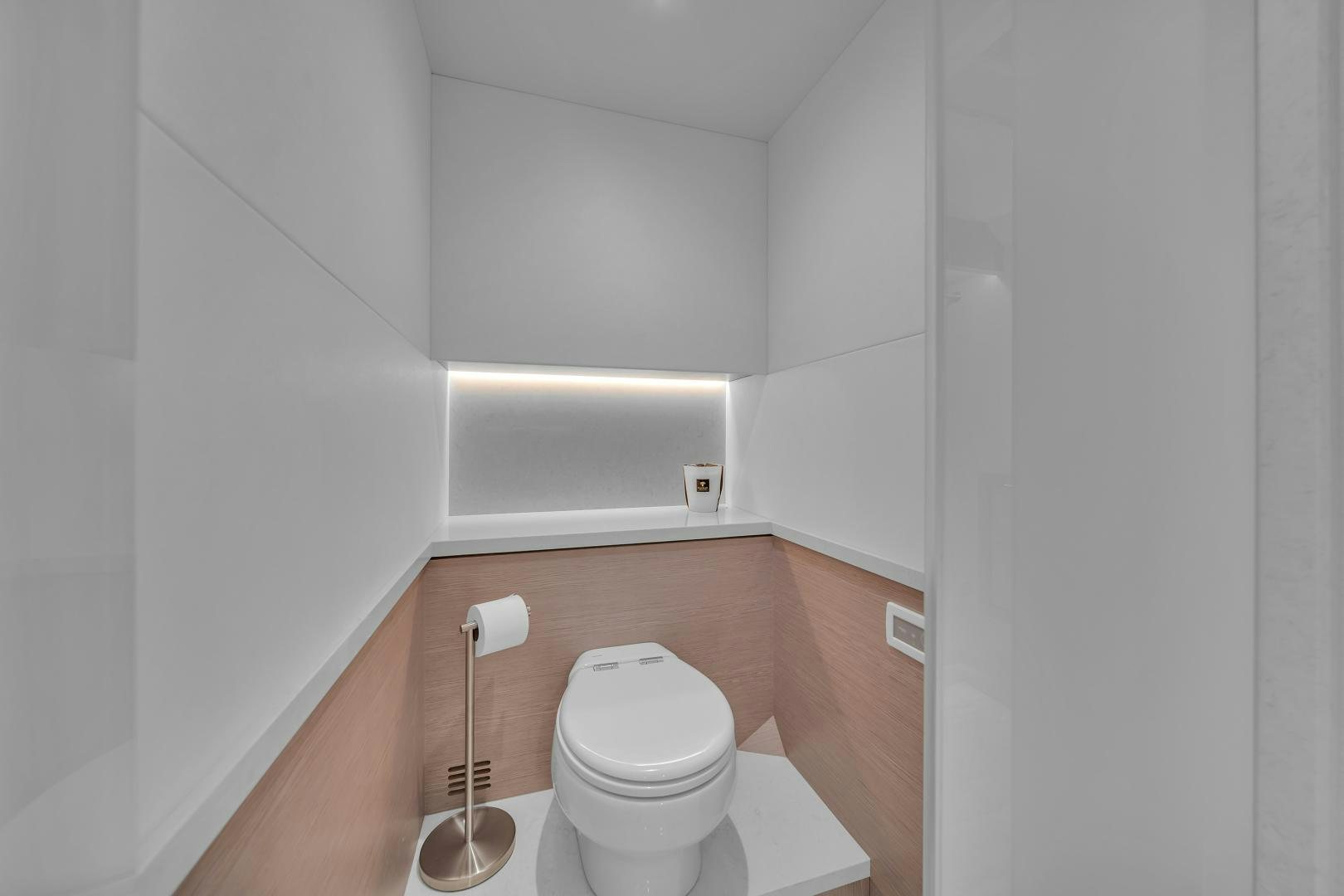 a toilet in a bathroom aboard CARBON COPY Yacht for Sale