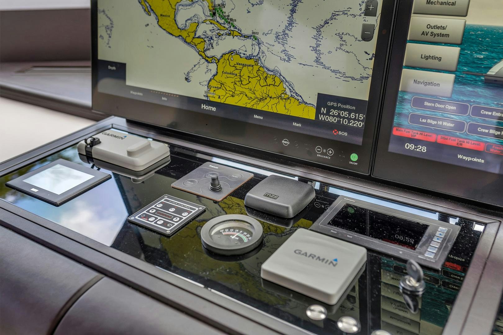 a computer monitor and a keyboard aboard CARBON COPY Yacht for Sale