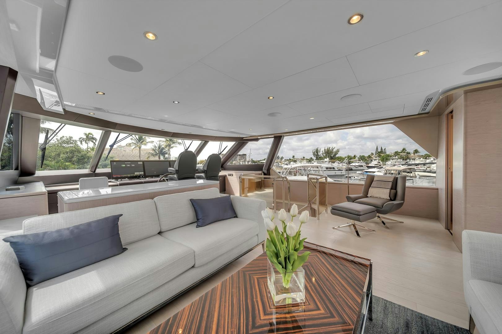 a living room with a large open window aboard CARBON COPY Yacht for Sale