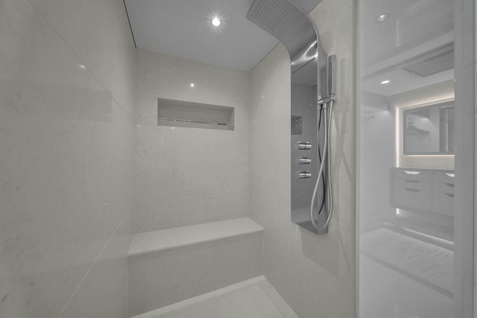 a bathroom with a large mirror aboard CARBON COPY Yacht for Sale