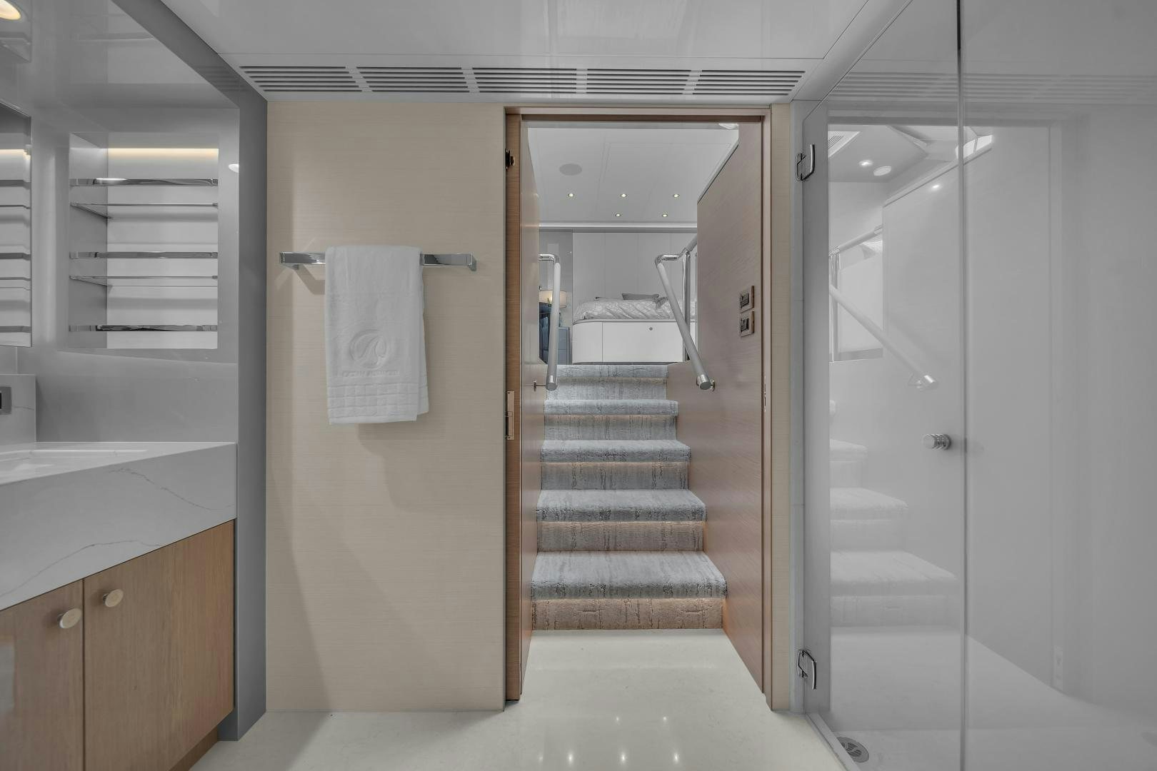 a bathroom with a glass shower aboard CARBON COPY Yacht for Sale