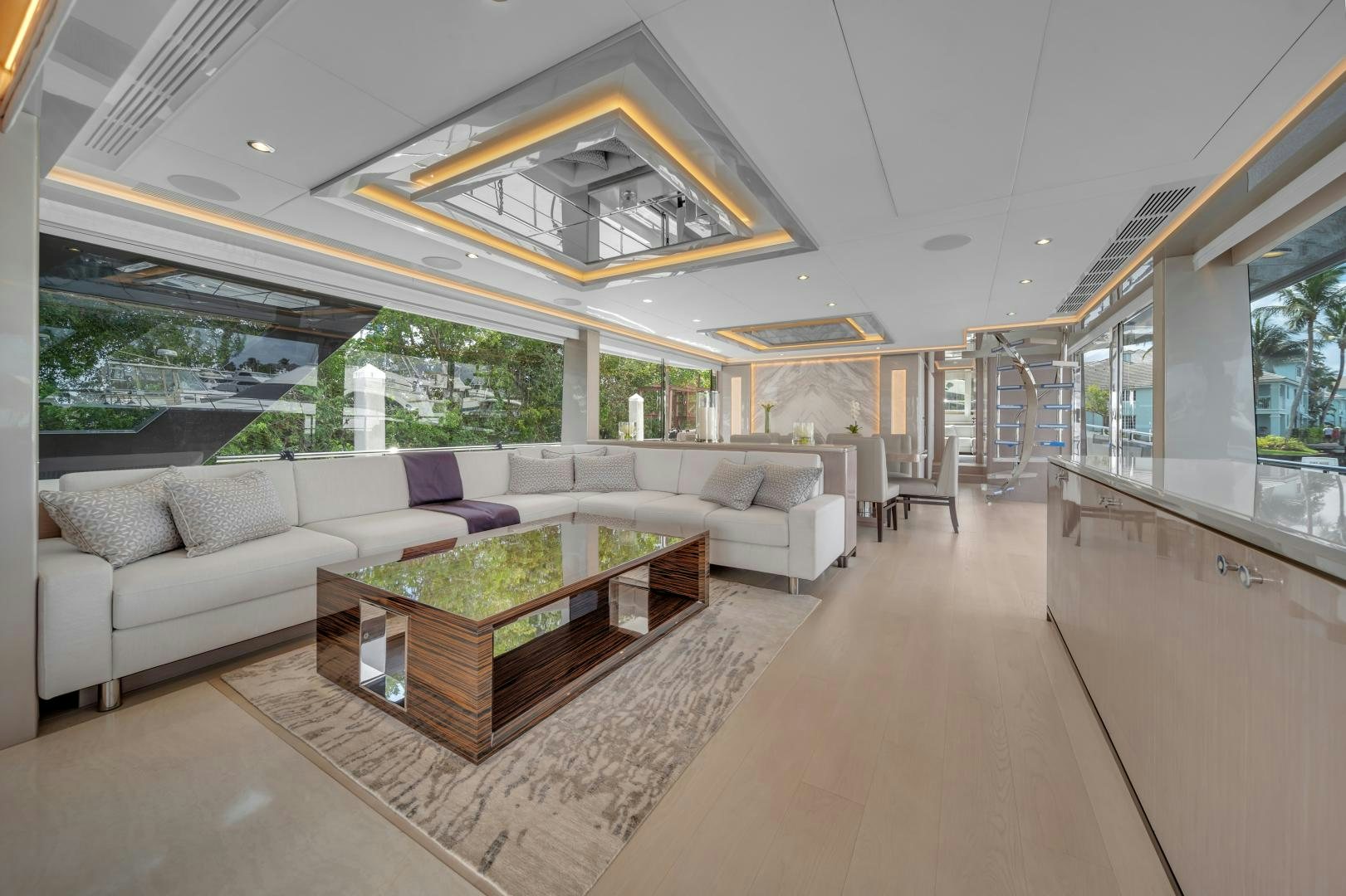 a living room with a large open window aboard CARBON COPY Yacht for Sale