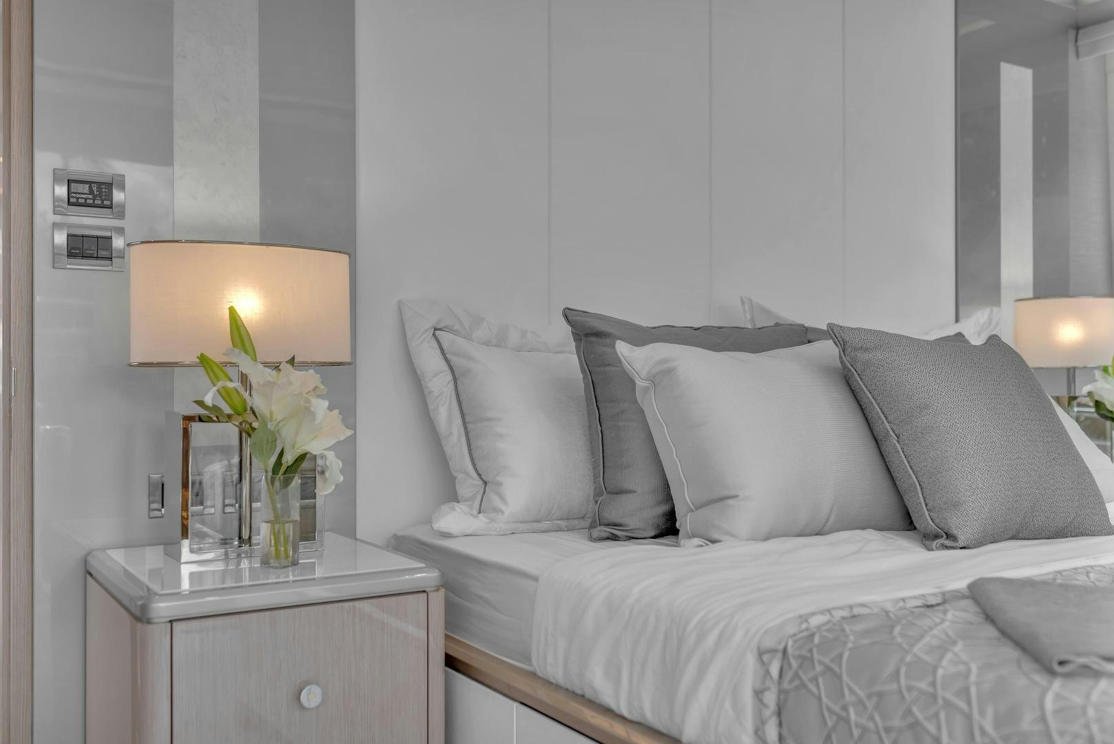 a bed with white pillows aboard CARBON COPY Yacht for Sale