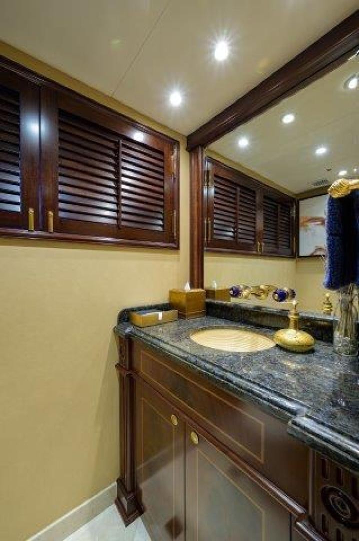 a kitchen with a marble counter top aboard UH OH Yacht for Sale