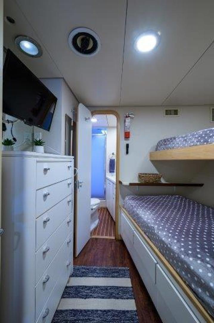 a bathroom with a sink and a bathtub aboard UH OH Yacht for Sale
