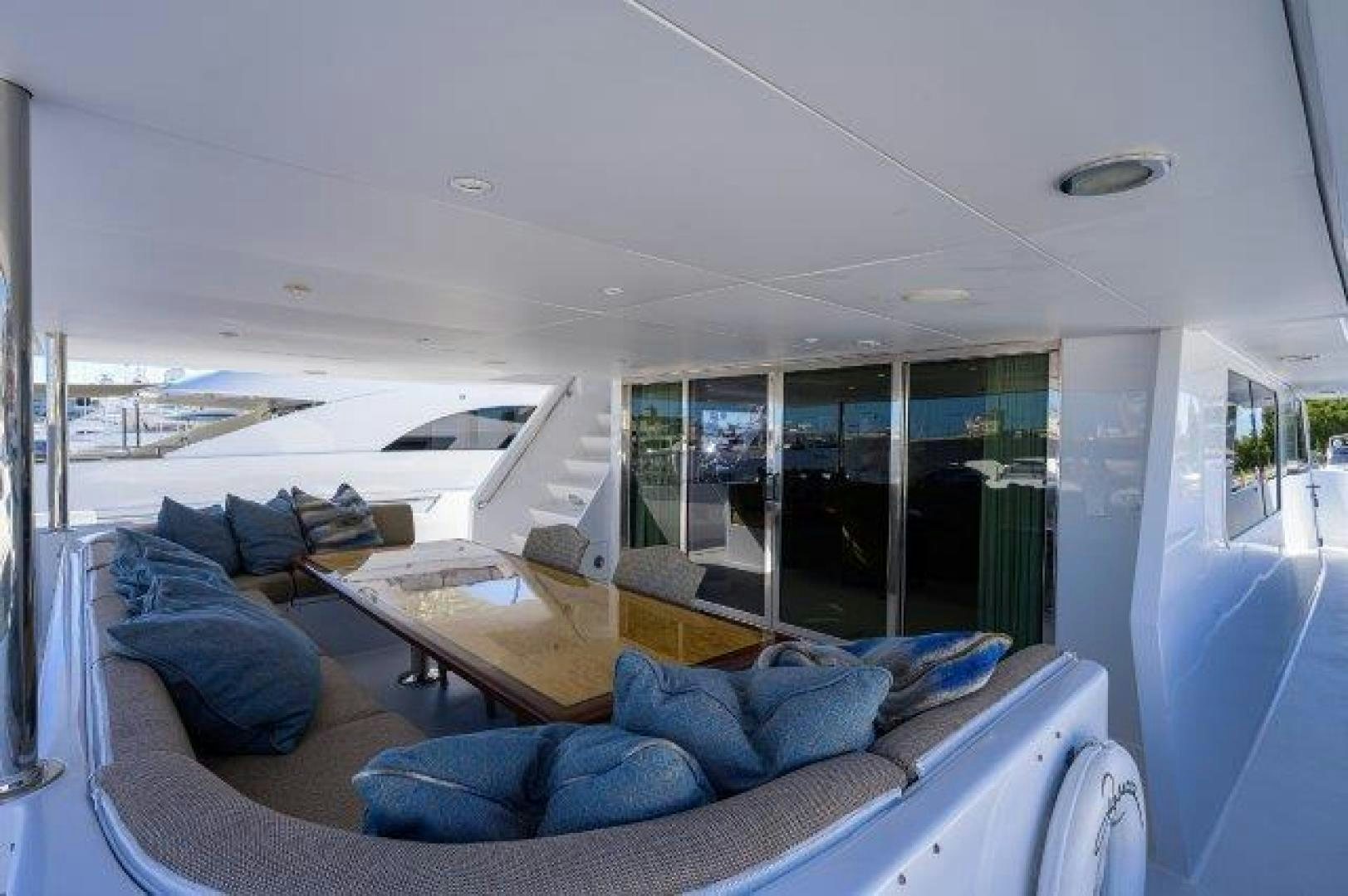 a living room with a large window aboard UH OH Yacht for Sale