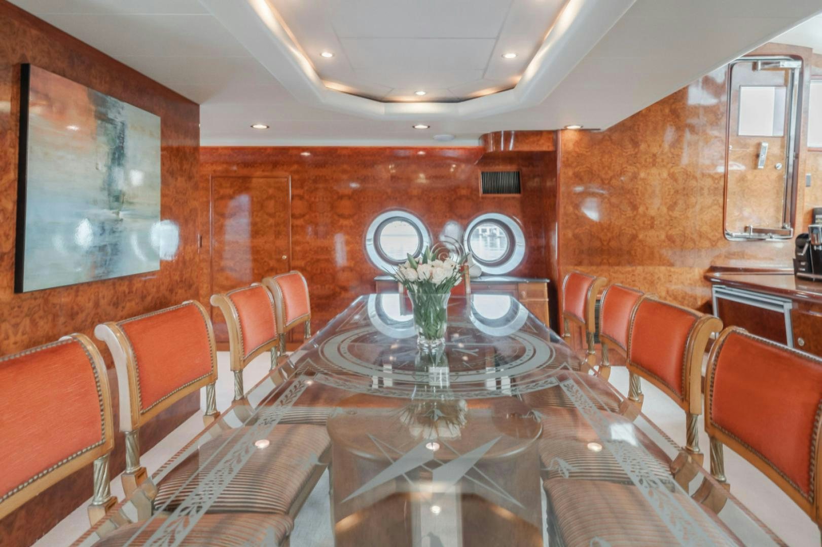 a dining room with a table and chairs aboard MARBELLA Yacht for Sale