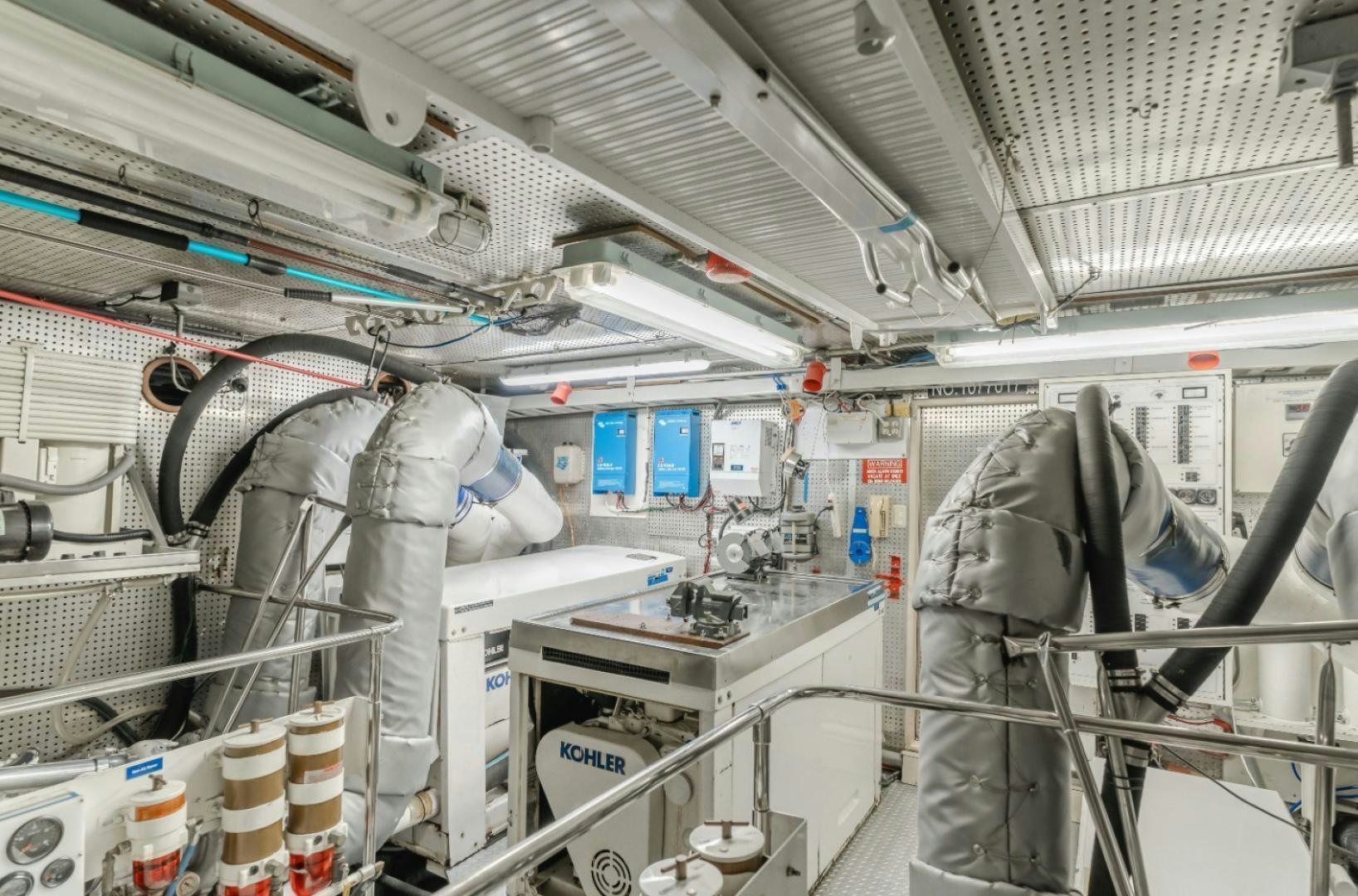 a room with several pipes aboard MARBELLA Yacht for Sale