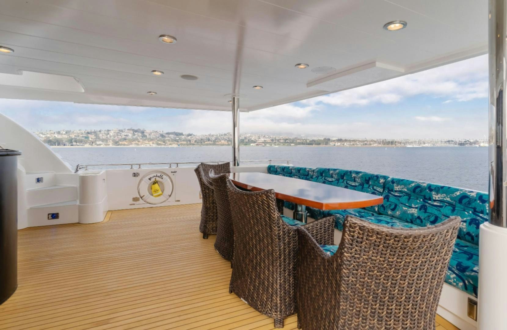 a large balcony overlooking a city aboard MARBELLA Yacht for Sale