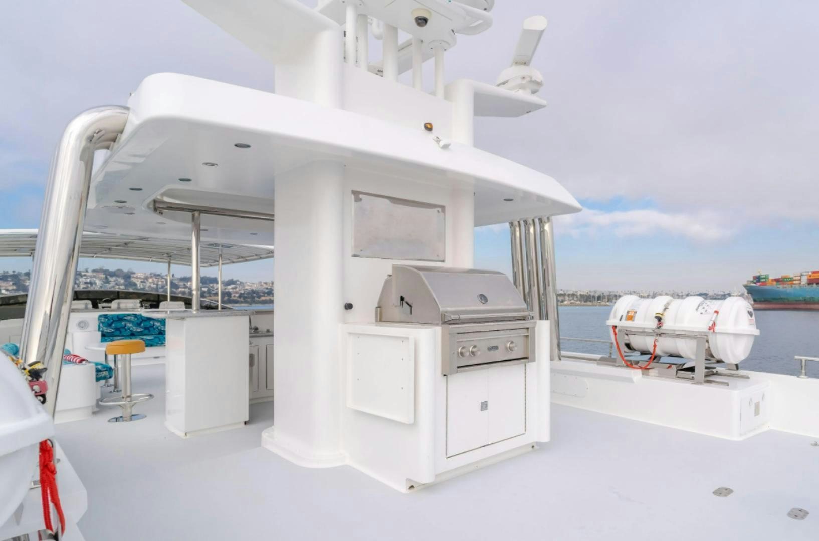a white machine on a white surface aboard MARBELLA Yacht for Sale