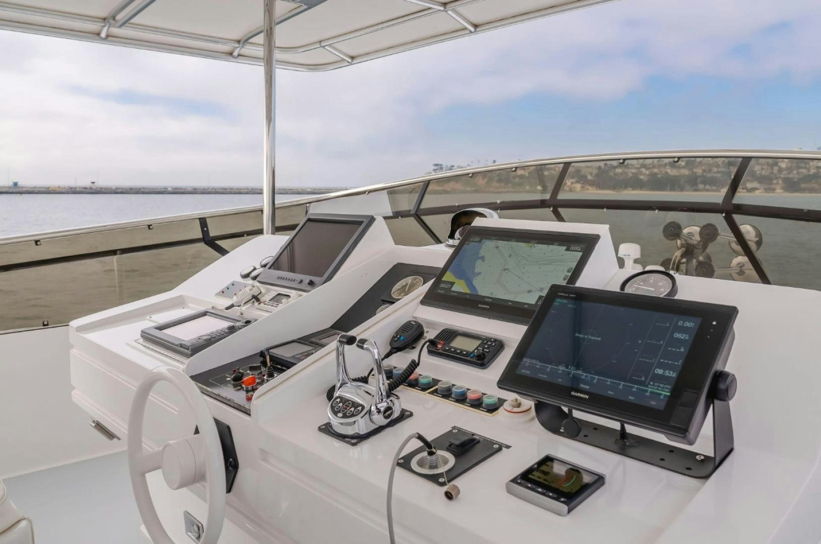 a white table with computers and electronics on it aboard MARBELLA Yacht for Sale