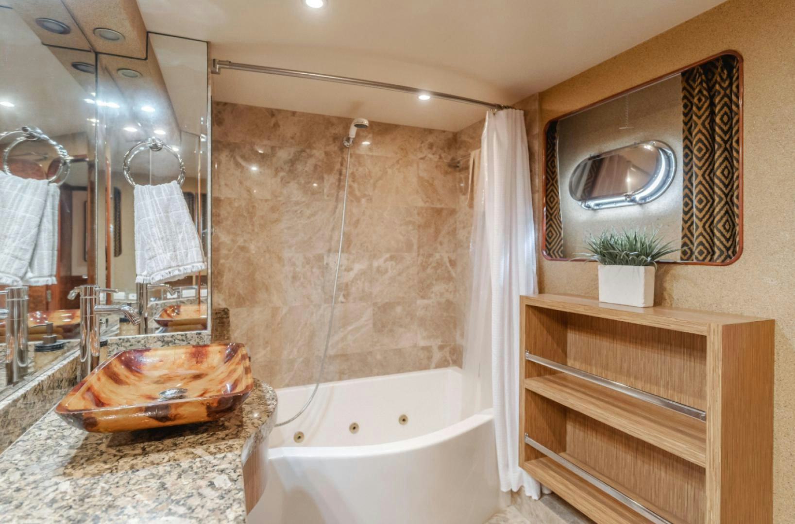 a bathroom with a large mirror aboard MARBELLA Yacht for Sale