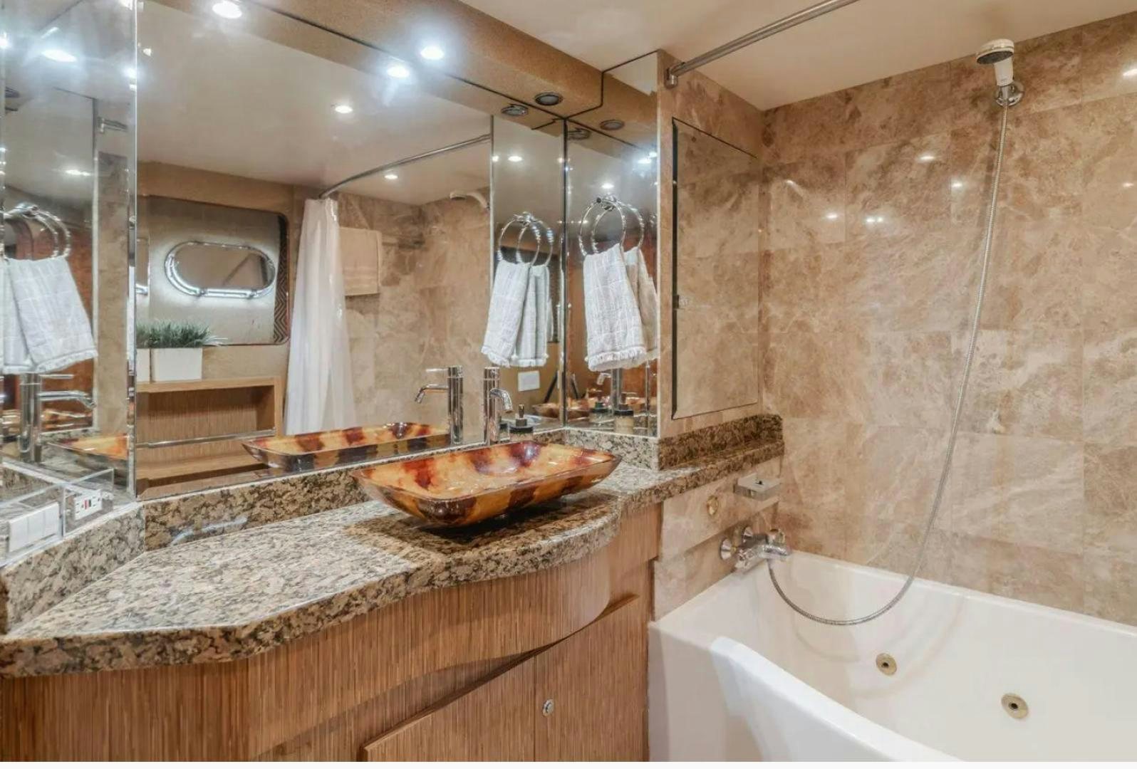 a bathroom with a large mirror aboard MARBELLA Yacht for Sale