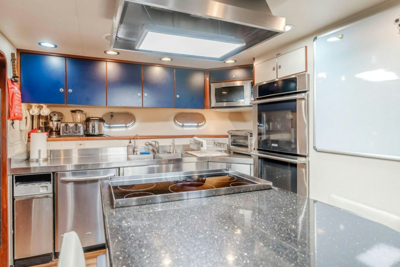 a kitchen with a stove and oven aboard MARBELLA Yacht for Sale