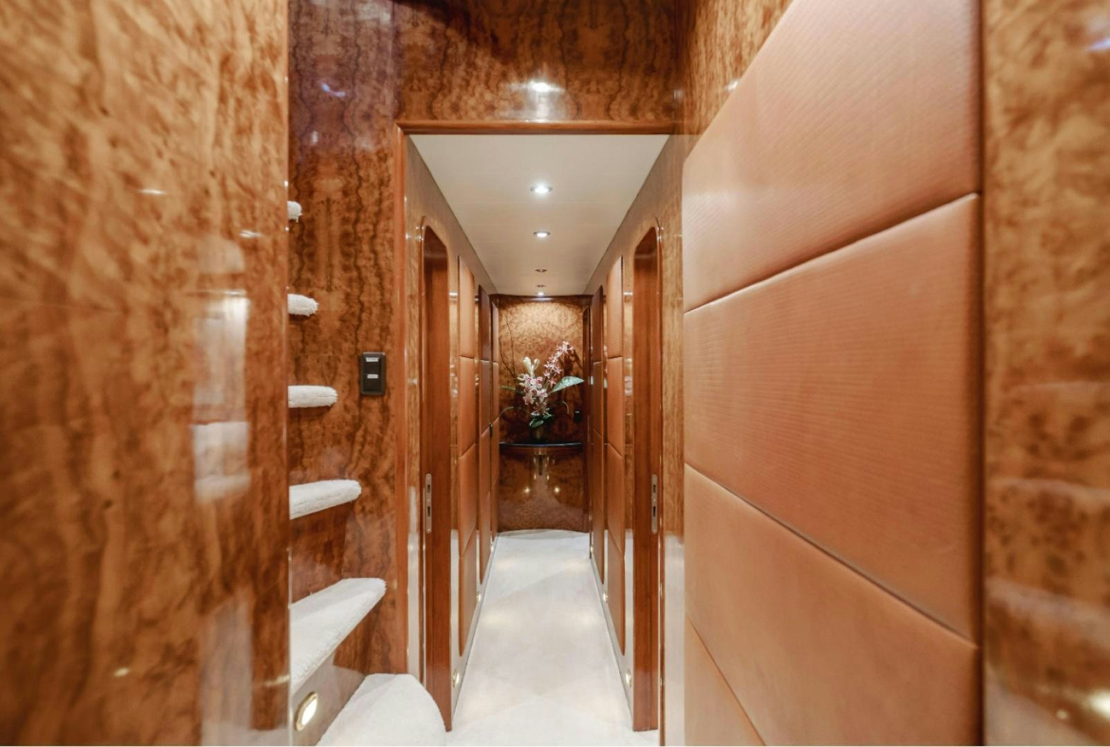 a bathroom with marble walls aboard MARBELLA Yacht for Sale