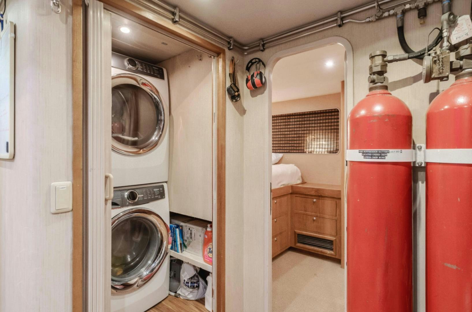 a room with a washer and dryer aboard MARBELLA Yacht for Sale