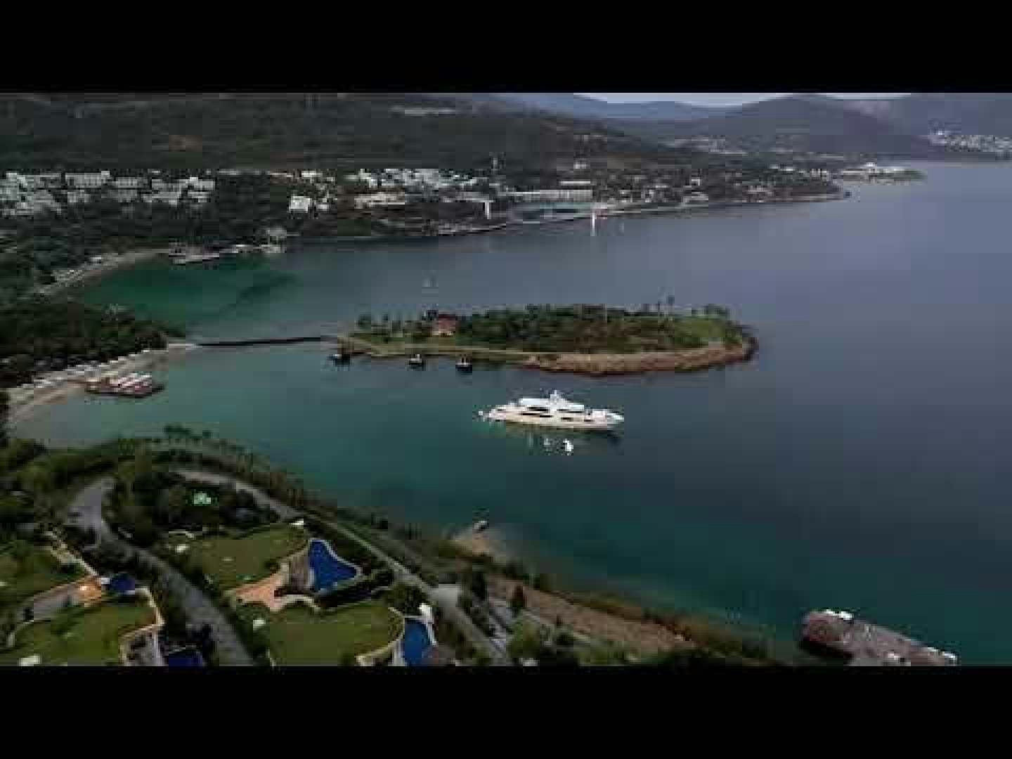 a city next to a body of water aboard VETRO Yacht for Sale