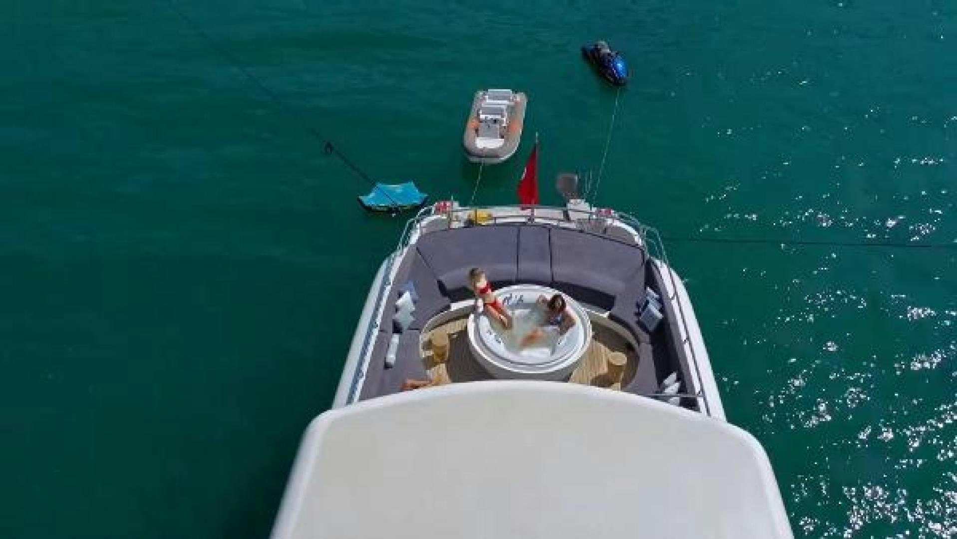 a boat with a person in it aboard VETRO Yacht for Sale