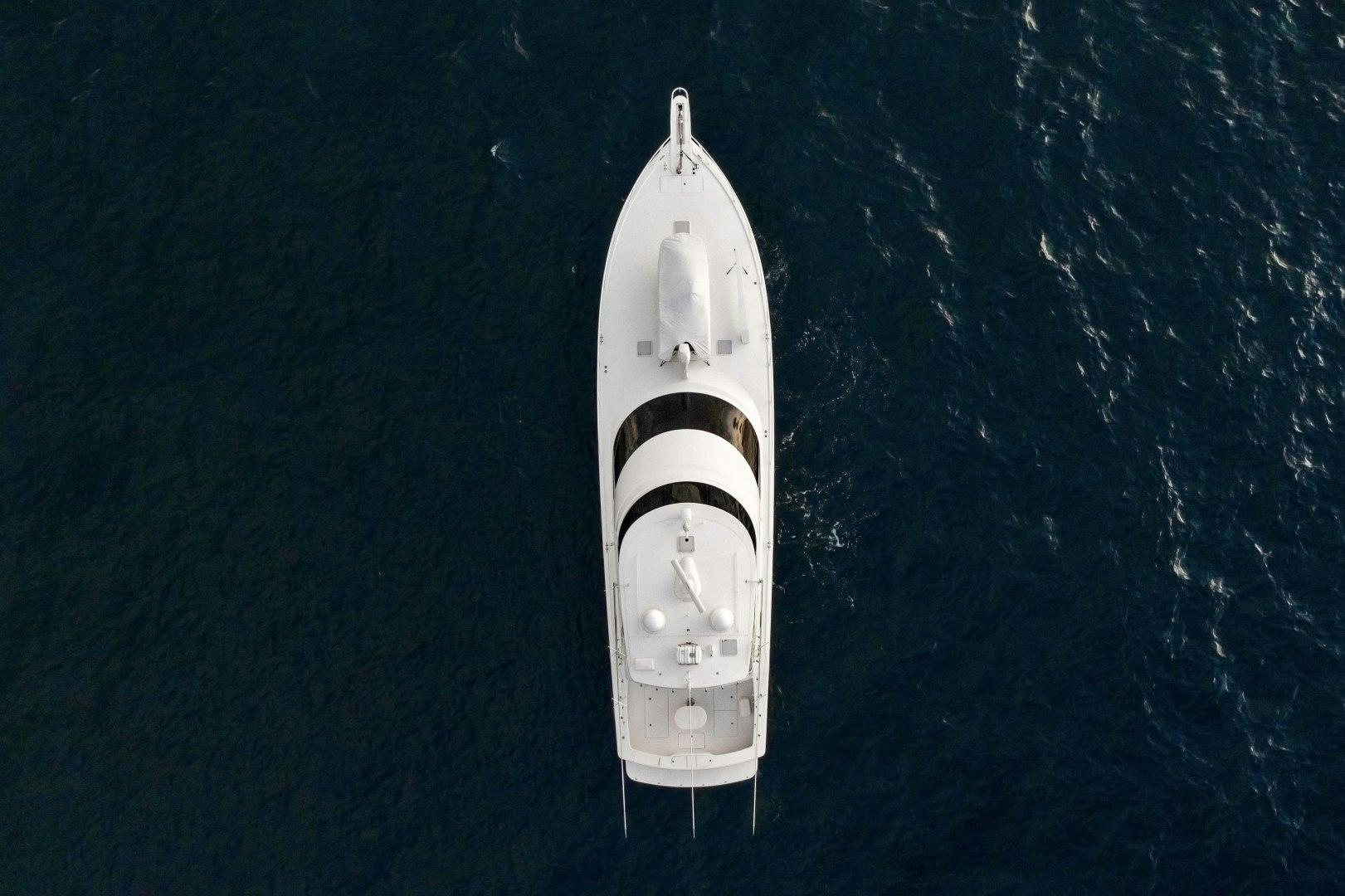 a space shuttle on a blue surface aboard LAST CALL Yacht for Sale