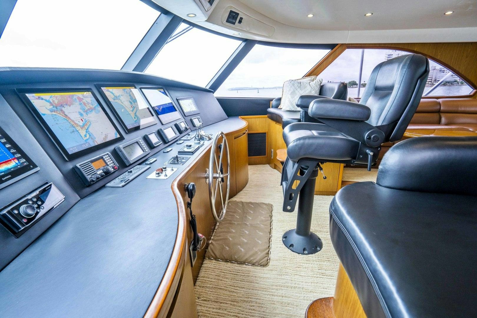 inside of a car aboard LAST CALL Yacht for Sale