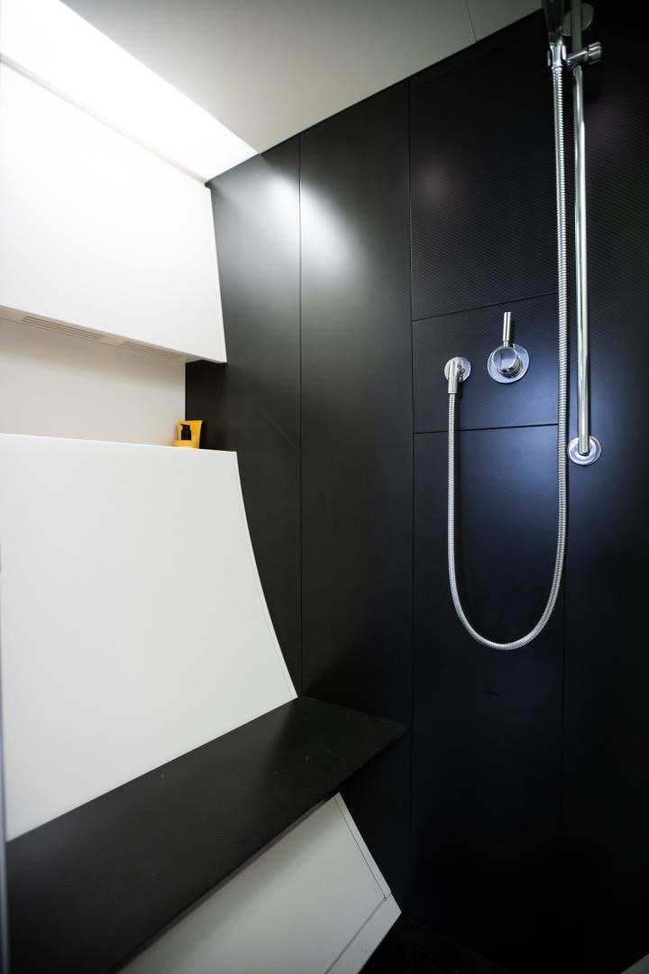 a bathroom with a shower unit aboard ASH Yacht for Sale