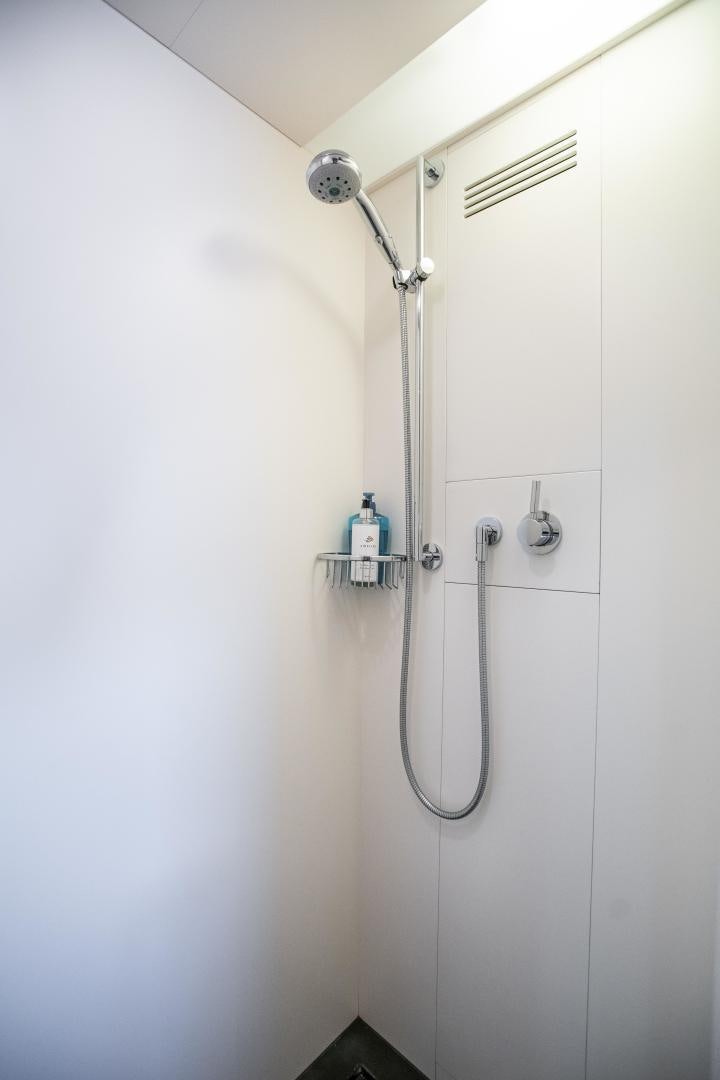 a shower with a clear glass door aboard ASH Yacht for Sale