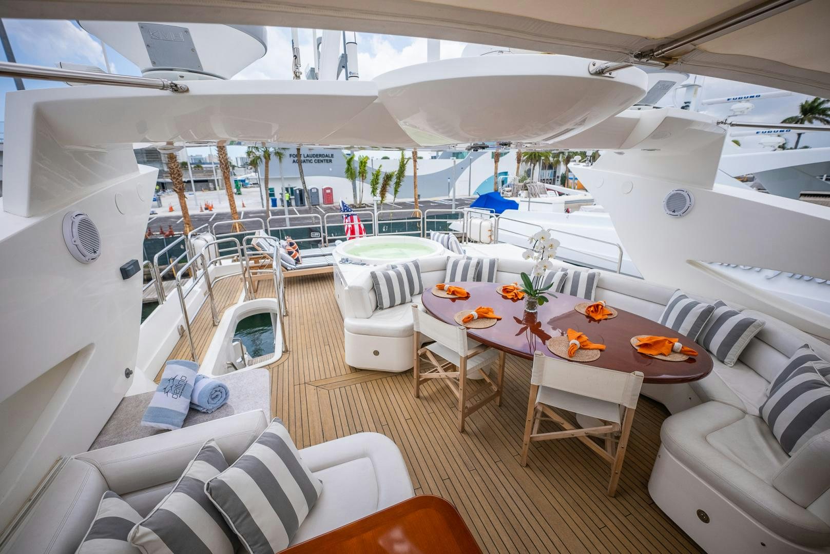 a boat with a table and chairs aboard DELFINO Yacht for Sale