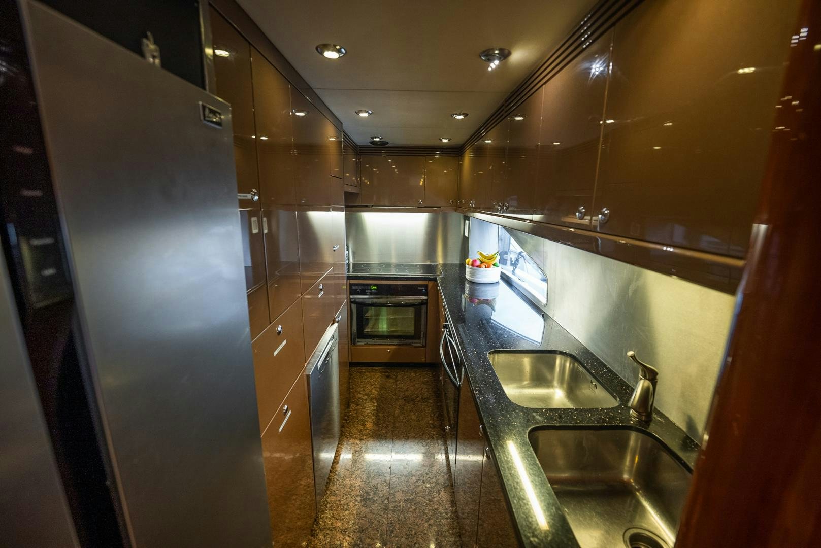 a kitchen with stainless steel appliances aboard DELFINO Yacht for Sale