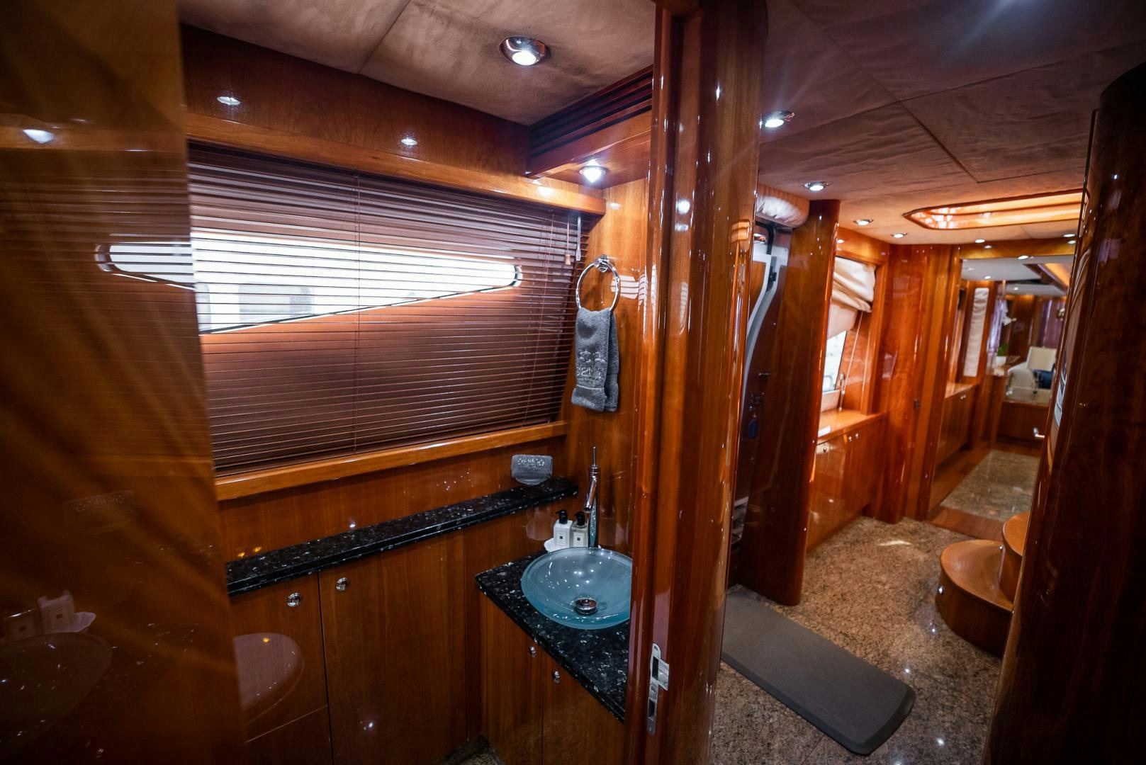 a bathroom with wood walls aboard DELFINO Yacht for Sale