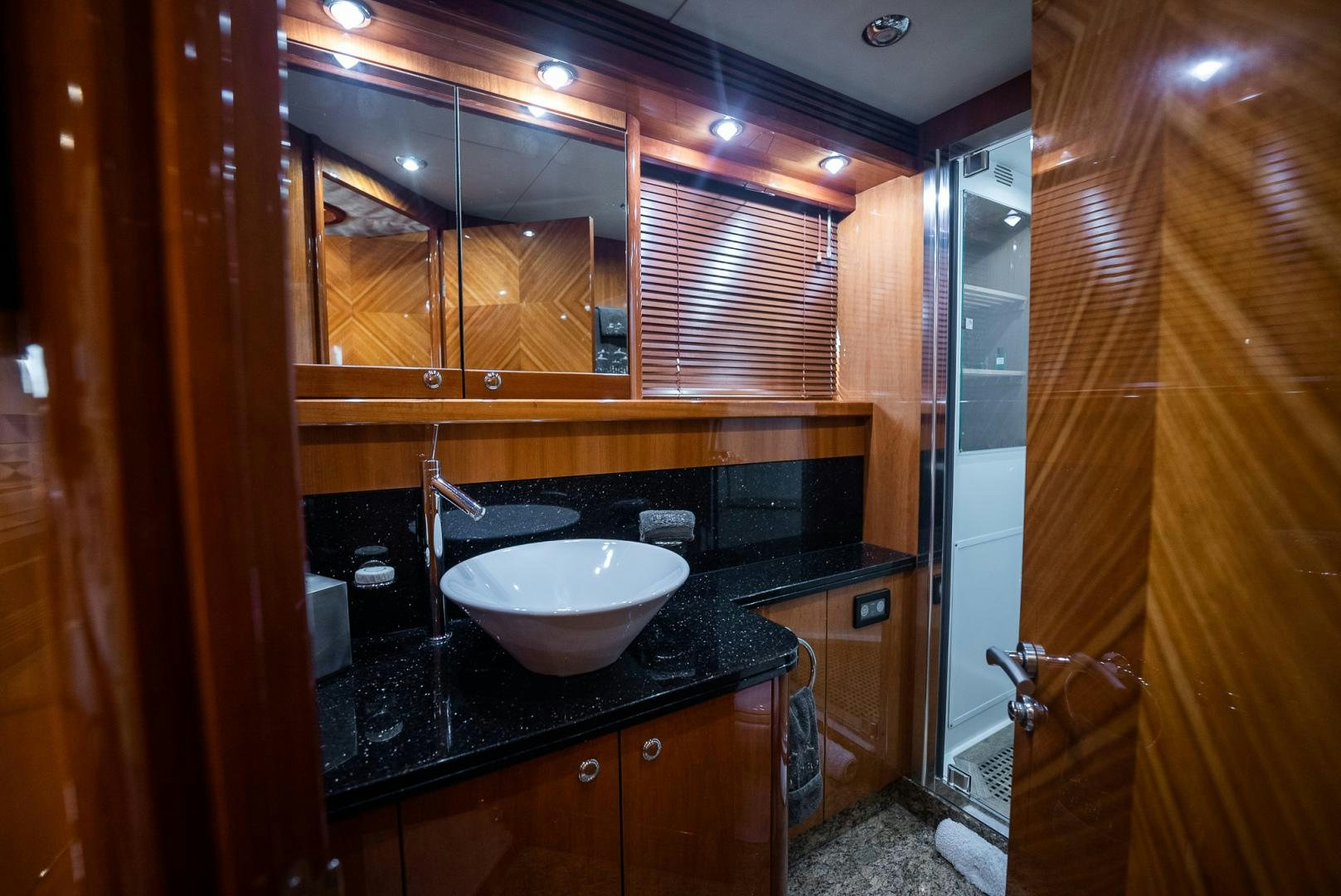 a bathroom with a sink and a mirror aboard DELFINO Yacht for Sale