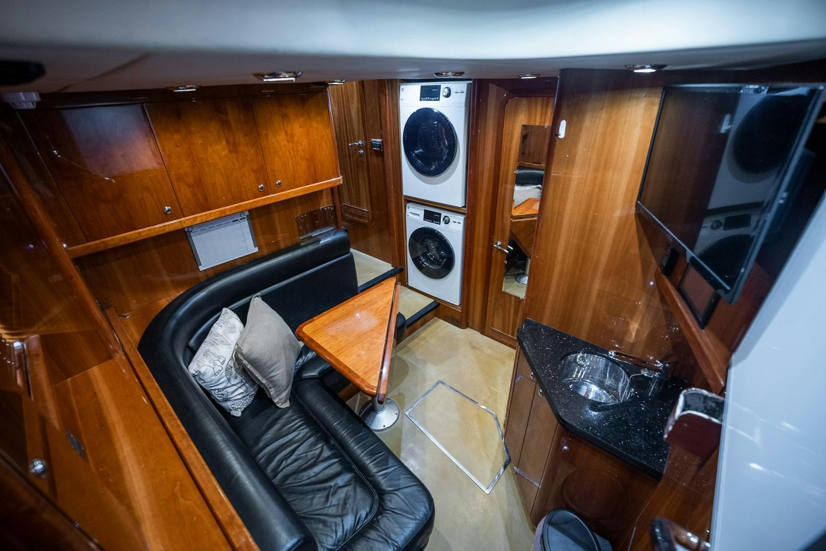 a leather chair in a room aboard DELFINO Yacht for Sale