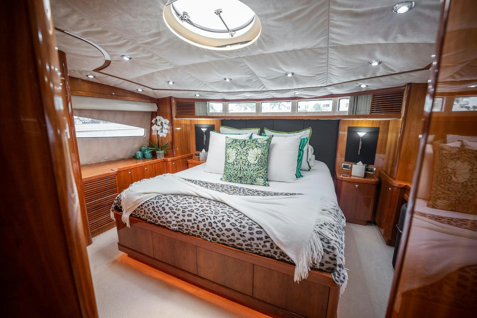 a bed with a white canopy aboard DELFINO Yacht for Sale