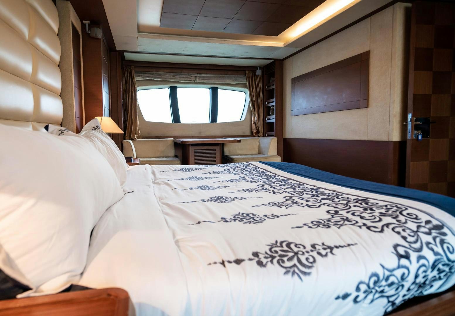 a bed with white sheets aboard CAMY ED Yacht for Sale