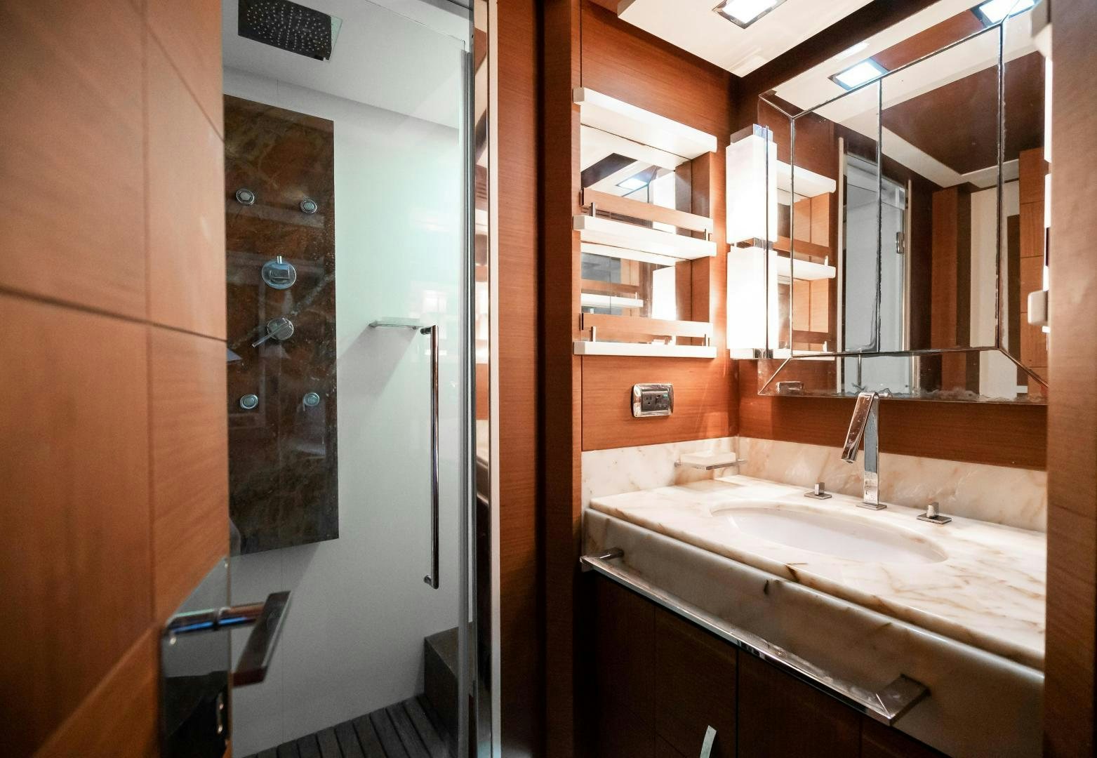 a bathroom with a sink and a mirror aboard CAMY ED Yacht for Sale