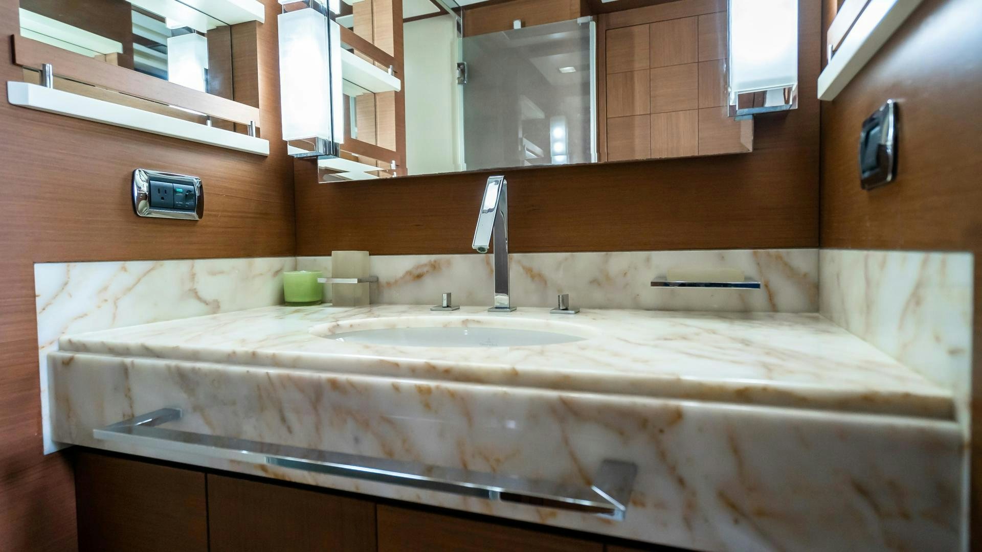 a bathroom with a sink and a mirror aboard CAMY ED Yacht for Sale