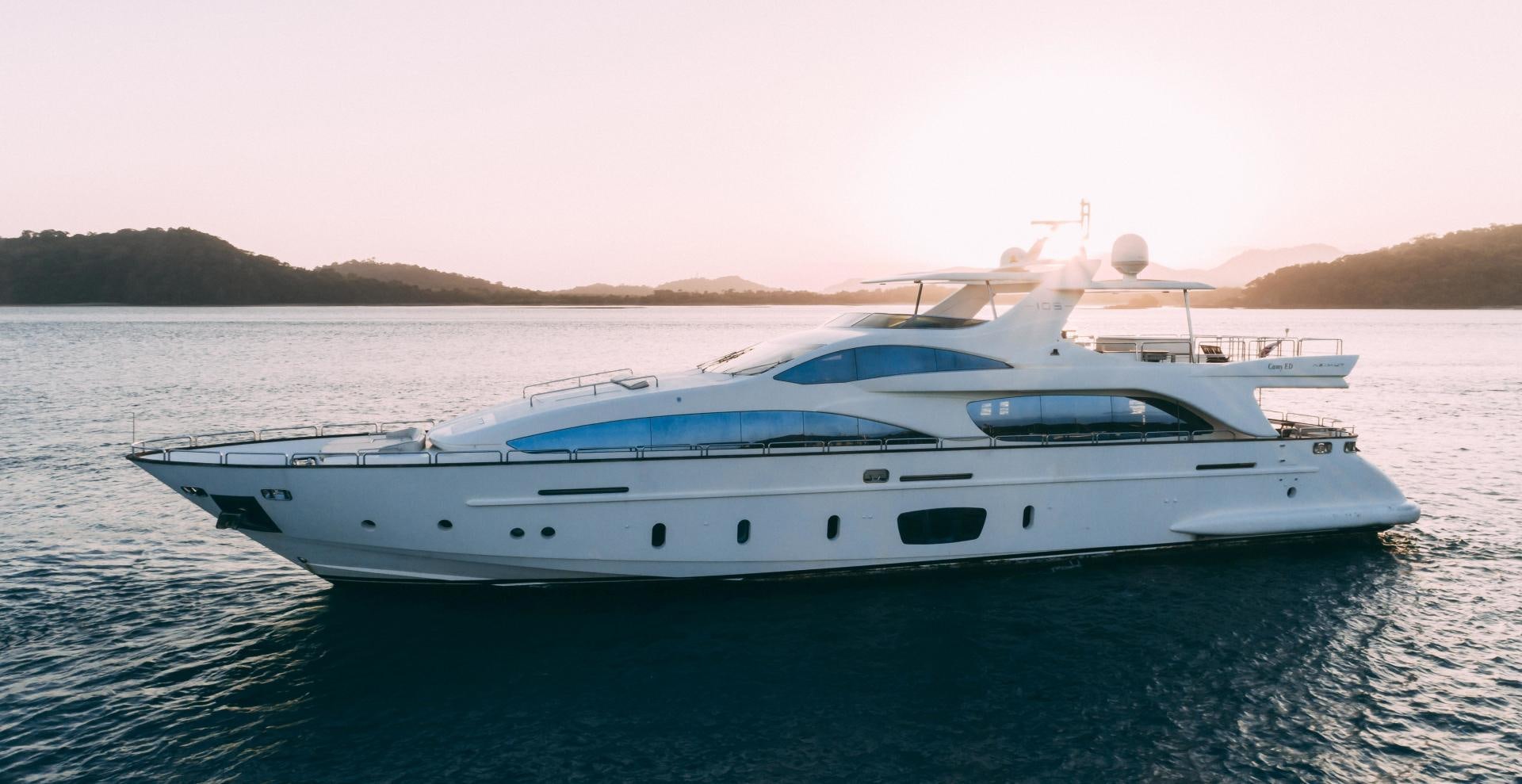 a white yacht on the water aboard CAMY ED Yacht for Sale