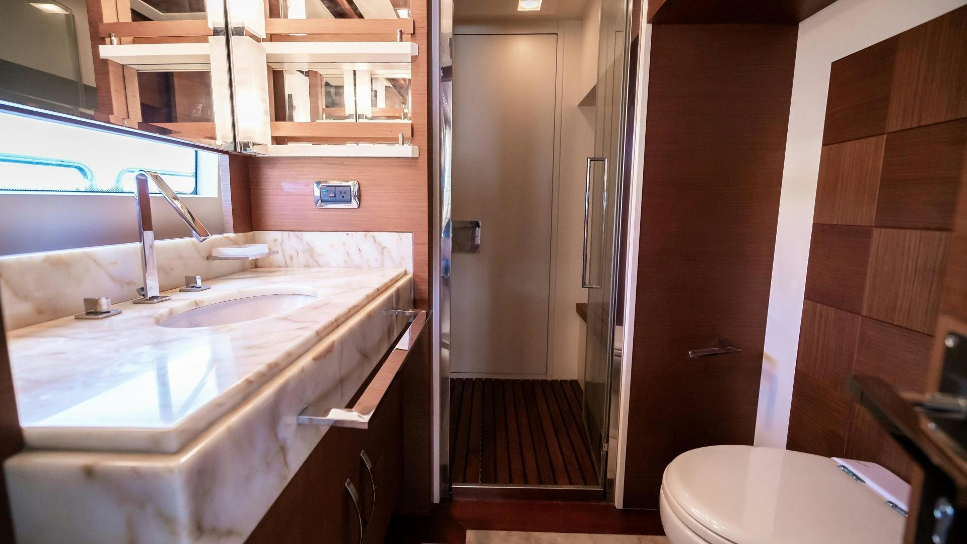 a bathroom with a sink and a toilet aboard CAMY ED Yacht for Sale