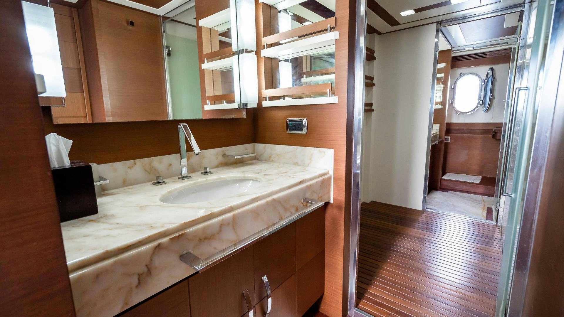 a bathroom with a sink and cabinets aboard CAMY ED Yacht for Sale