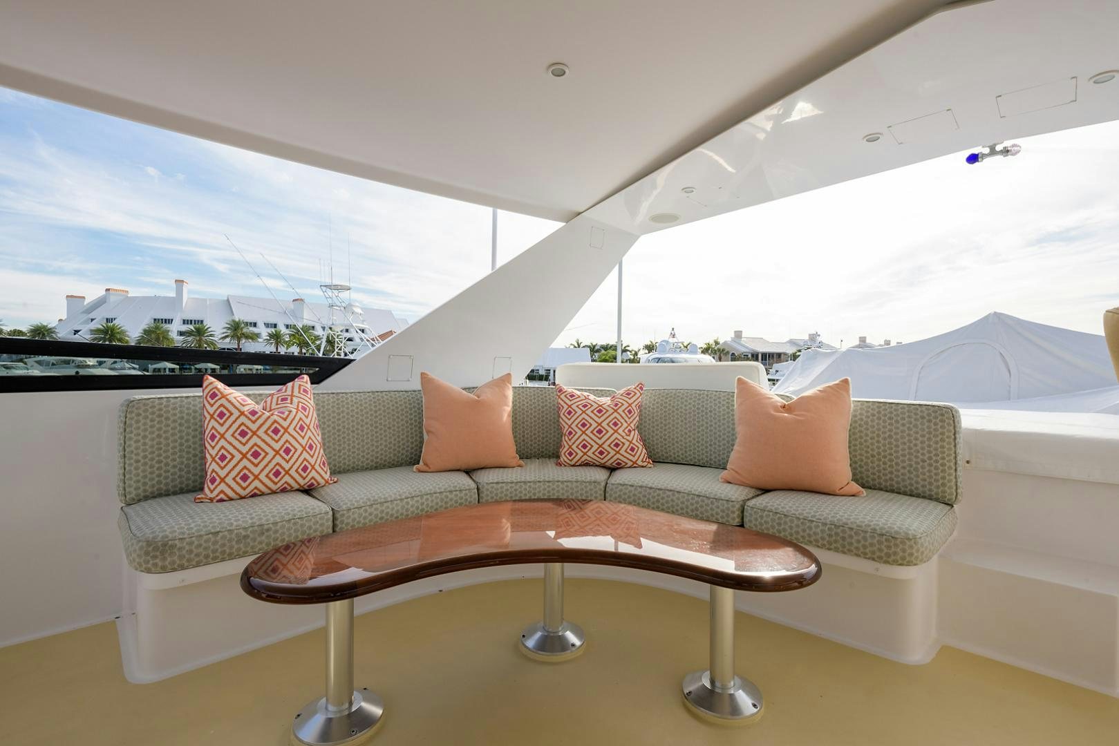 a couch with pillows on it aboard MY GIRL Yacht for Sale