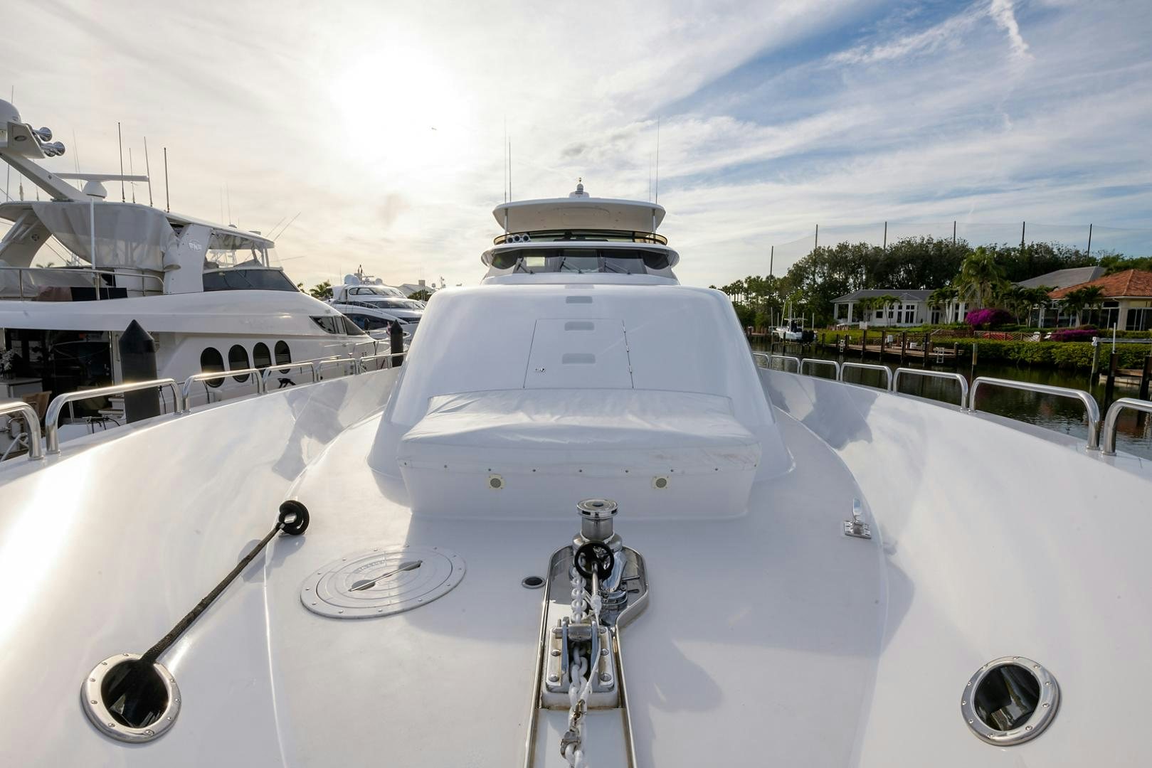 a white boat on a deck aboard MY GIRL Yacht for Sale