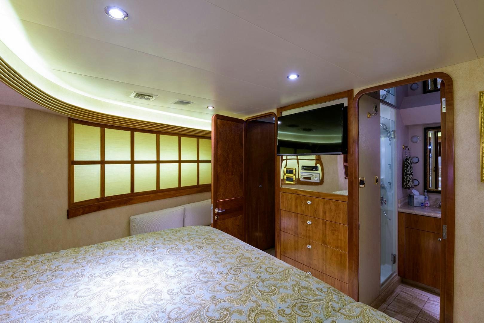 a bed in a room aboard MY GIRL Yacht for Sale