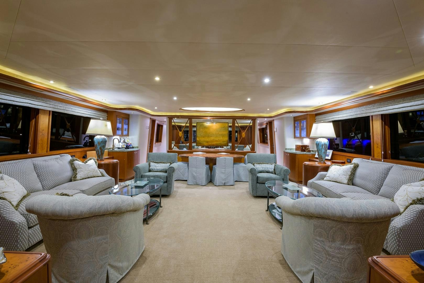 a living room with a large window aboard MY GIRL Yacht for Sale