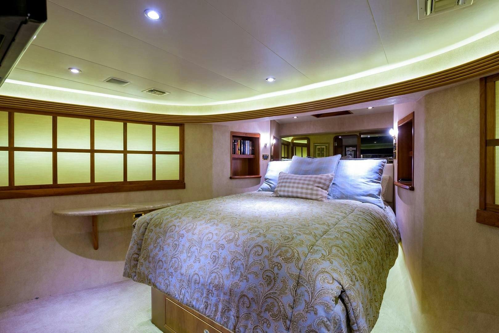 a large bed in a room aboard MY GIRL Yacht for Sale